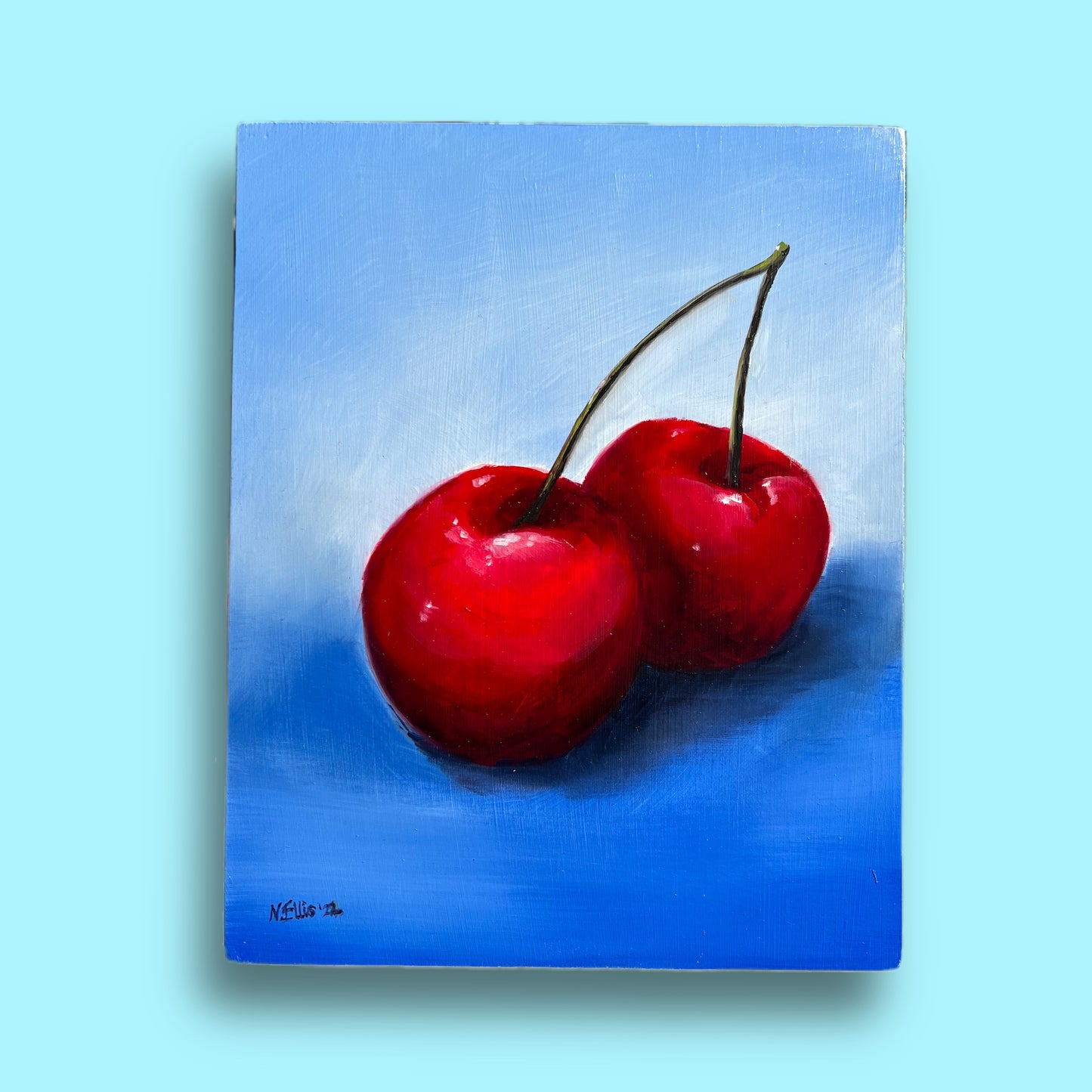 Cherries on blue background